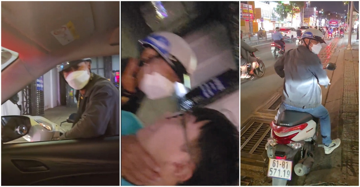 Tài xế taxi bị người đàn ông đi xe máy bóp cổ, xô ngã giữa đường缩略图